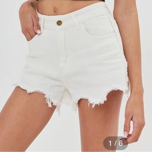 White frayed shorts